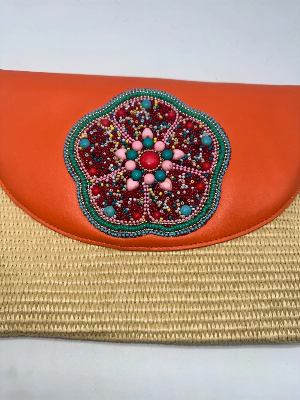 Handcrafted Orange Straw Clutch with Beaded Floral Accent